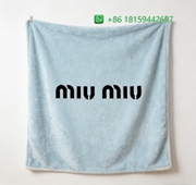 Miumiu Throw Blankets